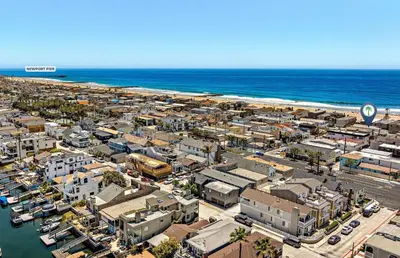 an aerial view of a city and the beach at 3Br W Spacious Oceanview Patio, Only One House From Sand By Beachview Rentals in Newport Beach