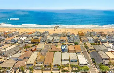 an aerial view of a city and the beach at Charming 4Br W Large Garden Patio, 2 Houses From The Sand By Beachview Rentals in Newport Beach
