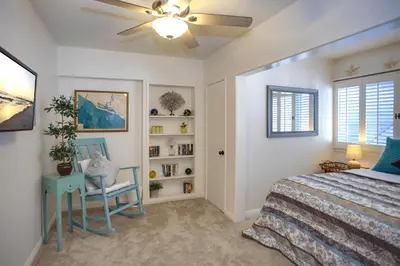 a bedroom with a bed and a ceiling fan at Quiet 1Br Bayside Apartment, Central, Steps To Baybeach By Beachview Rentals in Newport Beach