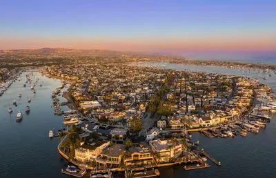 an aerial view of a harbor with boats in the water at Updated 1Br Bayfront Cottage W Deck In Quiet Balboa Island By Beachview Rentals in Newport Beach