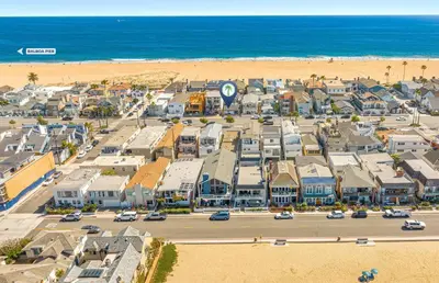 an aerial view of a town next to the beach at Stylish 2Br Cottage W Large Patio, One House From The Sand By Beachview Rentals in Newport Beach
