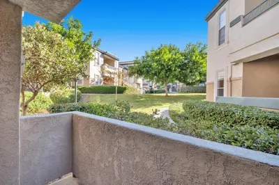 a retaining wall in front of a building at Heart of Carmel Valley 2BR, Families and Corp Stays in San Diego