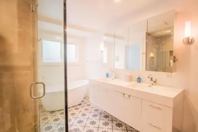 a bathroom with a tub and a sink and a shower at Deluxe Master Studio Private Entrance and Patio in San Diego