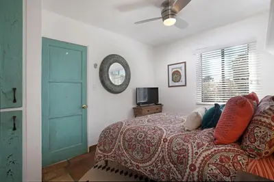a bedroom with a bed and a blue door at Old Town 1BR Short Drive to Downtown and Beaches 84 in San Diego