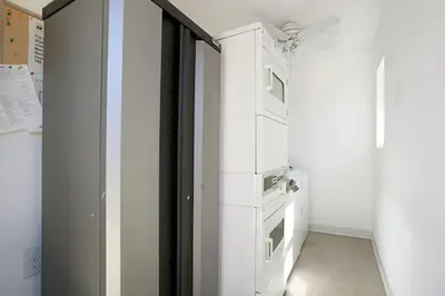 a white closet with drawers in a room at Old Town 1BR Short Drive to Downtown and Beaches 84 in San Diego