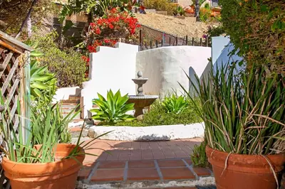 a garden with potted plants and a patio at Old Town 1BR Short Drive to Downtown and Beaches 84 in San Diego