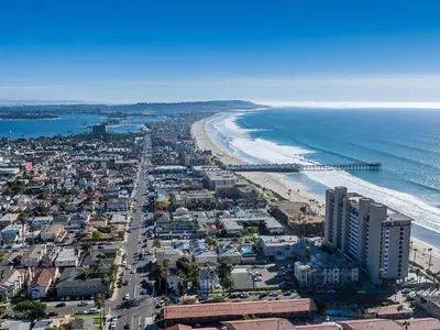 an aerial view of a beach and the ocean at Pacific Beach Cottage 2 Walk to the Beach and Bay in San Diego