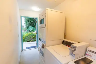 a small kitchen with a stove and a microwave at Old Town 1BR Short Drive to Downtown and Beaches 2.5 in San Diego
