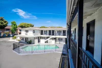 a view of a building from a balcony at ERTH INN by AGA- San Ysidro in San Diego