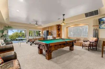 a living room with a pool table in it at Lakeside Mansion Waterfront 34 beds Boat ramp in Lake Elsinore