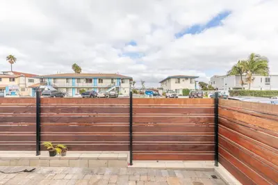 a wooden fence in front of some houses at Ocean Beach Bungalow Separate Entry in San Diego