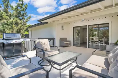 a patio with a table and chairs and a grill at Upscale 4BR Retreat near Monserate Winery Pool Spa in Fallbrook