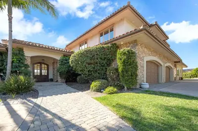 a house with a palm tree and a driveway at Hilltop Del Mar Lux Infinity Pool Panoramic Views in San Diego