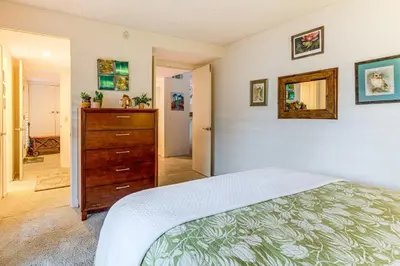 a bedroom with a large bed and a dresser at 2 Mi to Galleta Meadows Desert Golf Retreat! in Borrego Springs