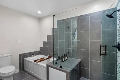a bathroom with a shower and a toilet at Spacious House close to Petco Park and Gaslamp in San Diego