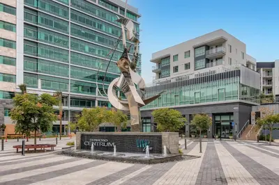 a statue of a ship in front of a building at Vive Luxe in San Diego