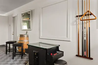 a game room with a game console and a video game at Casa Verde Wine Country Estate w Pickleball Casita in Temecula
