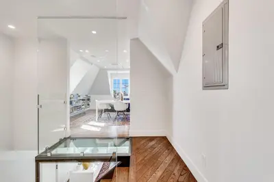 a room with a glass table and a dining room at European Charm Meets La Jolla Rooftop Views in San Diego