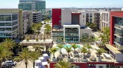 an aerial view of a city with palm trees and buildings at Vive on The Park in San Diego