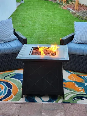 a coffee table with a fire in it on a patio at Sunny Loft Beaches Lakes Trails in La Mesa