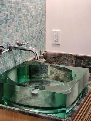 a bathroom with a green sink in a counter at Sunny Loft Beaches Lakes Trails in La Mesa