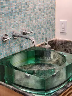 a bathroom with a glass sink with a faucet at Events Allowed: Sunny Villa| Lake| Trails| Beach in La Mesa