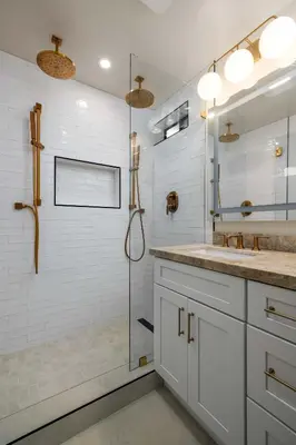 a white bathroom with a shower and a sink at The 357 Beach Pad, Renovated, Refined, Steps from the Surf! in San Diego