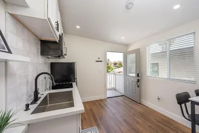 a kitchen with a sink and a counter at Beautiful cozy home in San Diego in San Diego