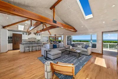 an open living room with a view of the ocean at Pacific Beach Oceanfront Compound with Casita in San Diego