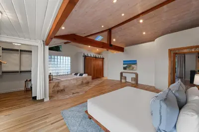 a living room with a couch and a bath tub at Pacific Beach Oceanfront Compound with Casita in San Diego