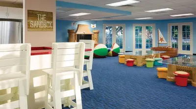 a childrens play area with chairs and tables in a room at Marriott's Newport Coast 2BR Apartment with Resort Access in Newport Beach