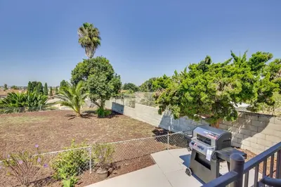 a camera on a fence next to a garden at Nice and Comfortable for family in San Diego