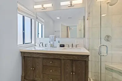 a bathroom with a sink and a shower at Carlsbad's Hidden Escape in Carlsbad