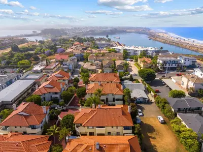 an aerial view of a town with houses and the ocean at Carlsbad's Hidden Escape in Carlsbad