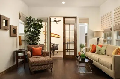 a living room with a couch and a chair at Coastal Oasis Walk to Ocean Bay and Rooftop Deck in San Diego