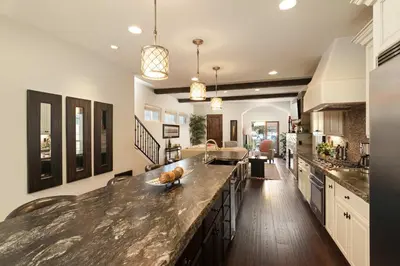 a kitchen with a large counter top in a room at Coastal Oasis Walk to Ocean Bay and Rooftop Deck in San Diego