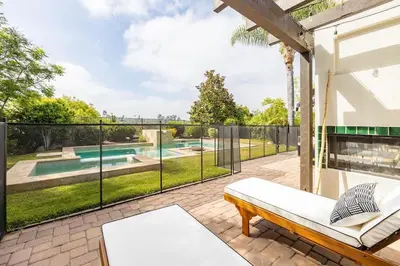 a patio with a view of a swimming pool at Gated Home With Pool & Hot Tub in Vista
