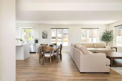 a living room with a couch and a table at Ocean Beach Getaway with Peek Views in San Diego