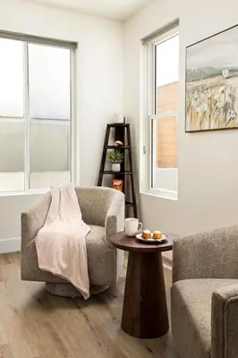 a living room with two chairs and a coffee table at Ocean Beach Getaway with Peek Views in San Diego