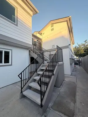 a set of stairs leading to a house at Stylish 1BR Near Downtown, Beaches & North Park in San Diego