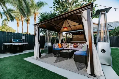 a gazebo with a couch and a table at Central SD, Luxury Home and Casita, Pool, BBQ, Sleeps10 in La Mesa