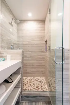 a bathroom with a shower with a glass door at Modern Surf Themed Home - Heart of Gaslamp in San Diego