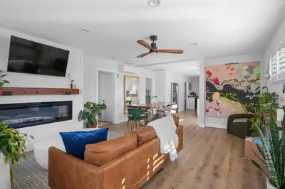 a living room with a couch and a table at Renovated 3BR House with Heated Pool and Backyard Oasis in San Diego