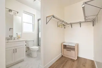 a white bathroom with a toilet and a sink at Coastal Ocean Beach Compound Escape in San Diego