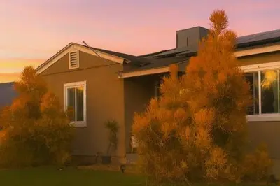 a house with trees in front of it at Cozy Home in National City 15 min from San Diego in National City