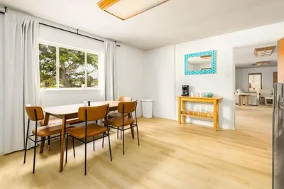 a dining room with a table and chairs at Spacious 2 Bed in Carlsbad in Carlsbad