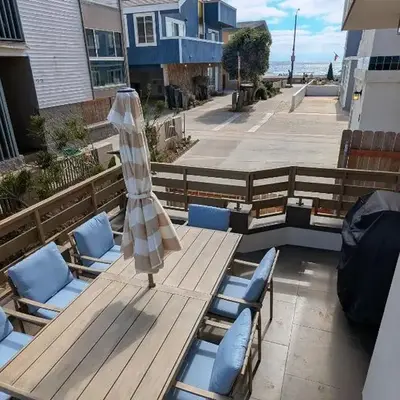 Steps from Ocean! Ocean and Bay Views! Rooftop Deck! Two-Car Garage! Renovated!