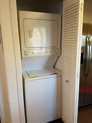 a small white refrigerator in a small kitchen at BBQ Grill 5 mins to DT Canyon Views Parking in San Diego