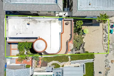 an overhead view of a building with a pool at Exclusive Beachfront Duplex in Carlsbad Village Ocean Views, Sleeps 9 in Carlsbad