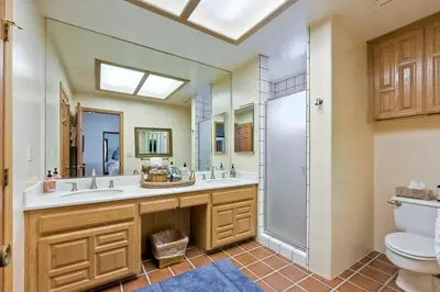 a bathroom with two sinks and a shower at Direct Beach Access, Views, Carlsbad 2BR Upper Unit in Carlsbad